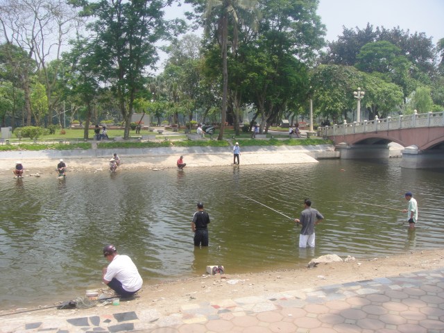 Fisherman in Bay Mau Lake, Lenin Park