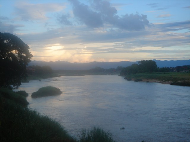 The sun sets over the Mekong