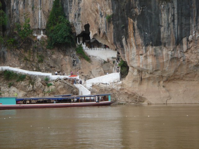 Docking at the Pak Ou caves. Water levels can rise high enough to cover the cave mouth