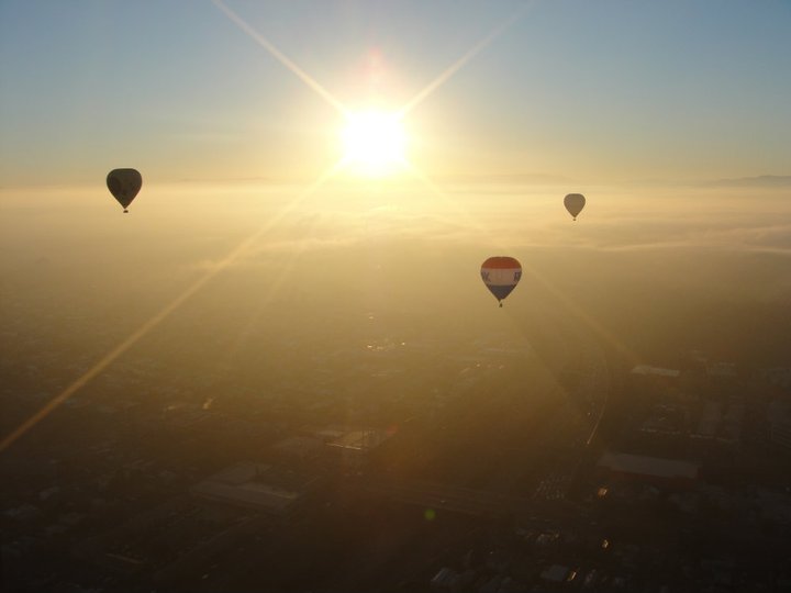 Floating high over a Melbourne dawn