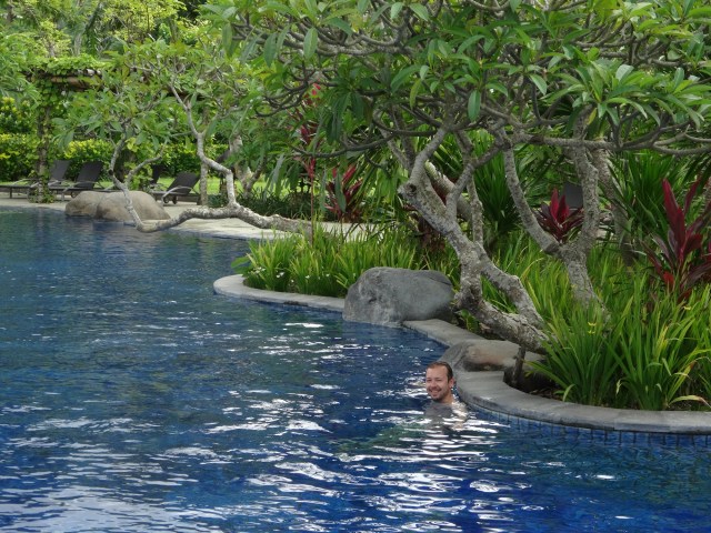 Cooling off in the pool at the Bintang Flores Hotel