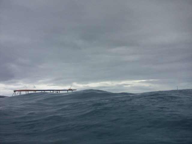 Choppy waves obscure the boat