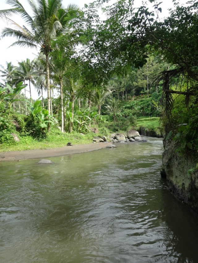 Cooling our feet off in the river... however it made for a slippery ascent back to the top!
