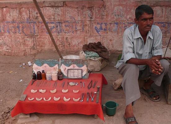 "...an Indian dentist awaits intrepid patients at Bundi market in Rajasthan" - Courtesy of The Telegraph