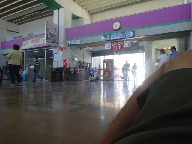 Killing time on the bus terminal floor…