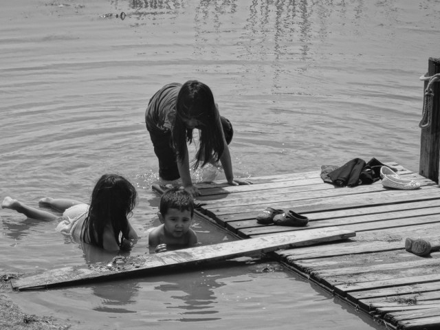 Local kids taking advantage of the low water levels at the end of the pier