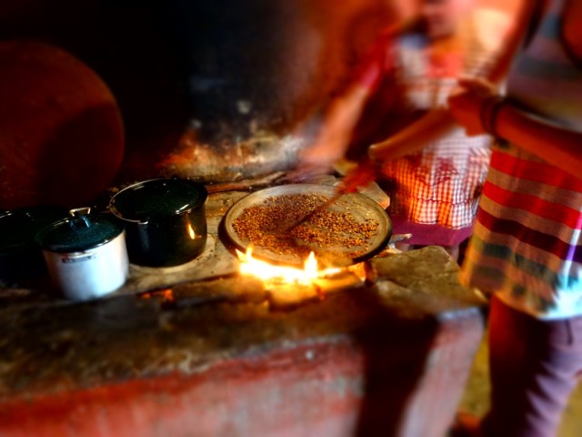 Roasting coffee over the kitchen fire