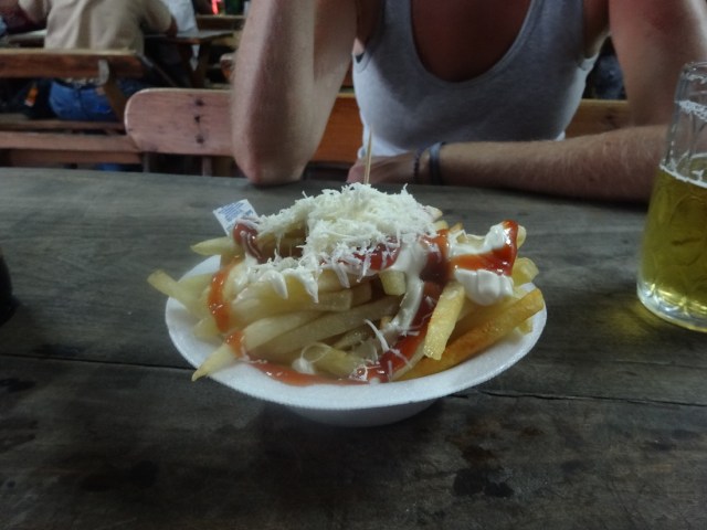 The beer snack of champions! Fries with ketchup, cheese and cream