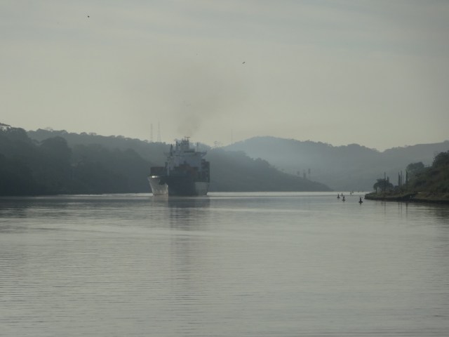 Ships apparently navigate the canal channel 24/7