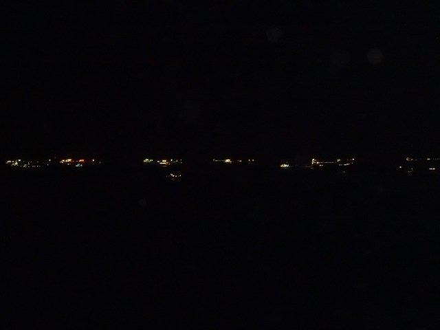 Ships linger near the Caribbean entrance to the canal