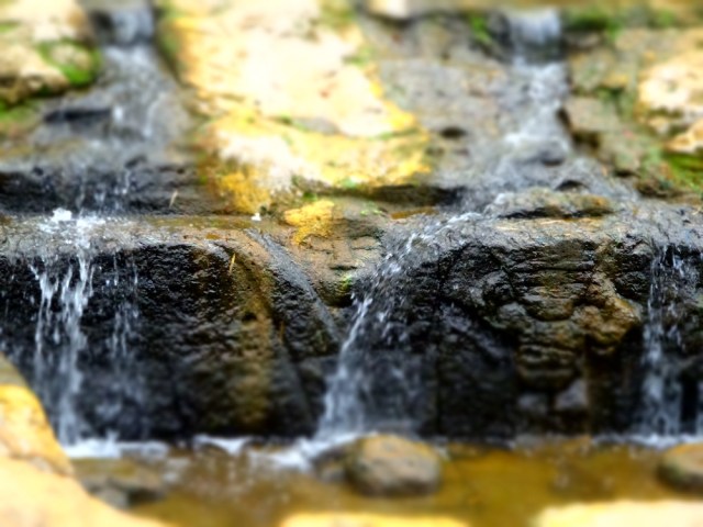 ...an amazing fountain carved directly into the rock of the riverbed!