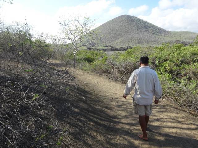 Our guide Victor leads us on into the rugged interior, safe in his 'endemic' shoes