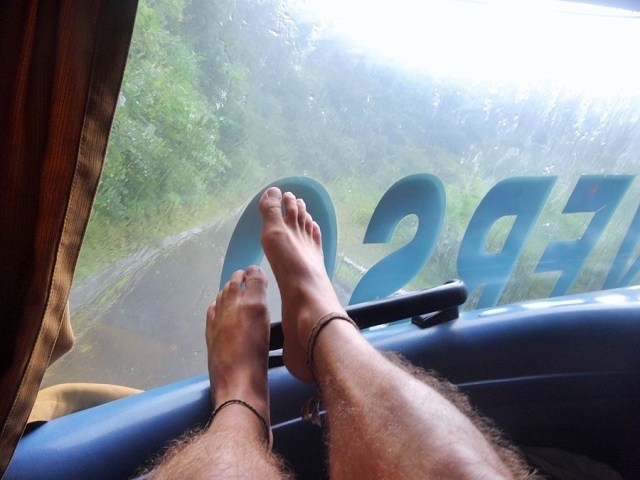 Feet up, in deep, useless thought...