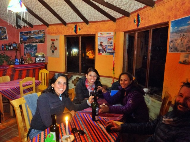 Our 3 crazy Colombians. Why find a bed, when you can find wine?
