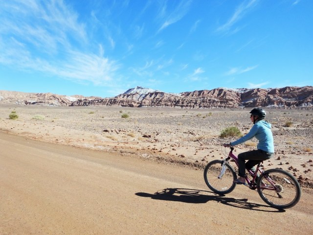 The incredible sight of salt-capped mountains (looked to me like snow), and the just as rare sight of Sarah on a bike!)