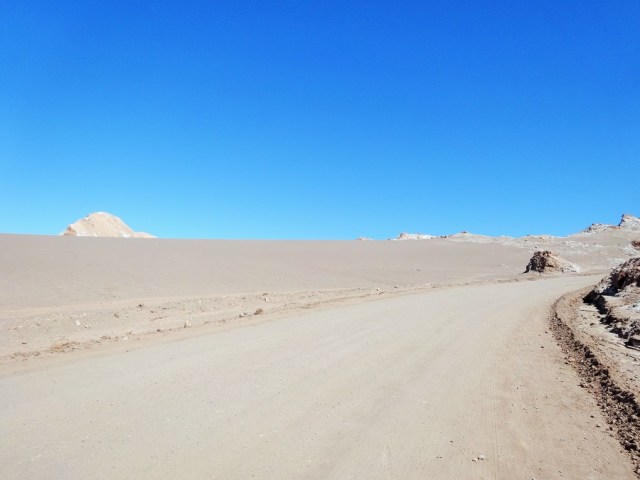 Crawling our way uphill past desert dunes