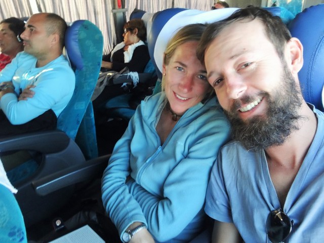 Still managing a smile despite hours on the bus