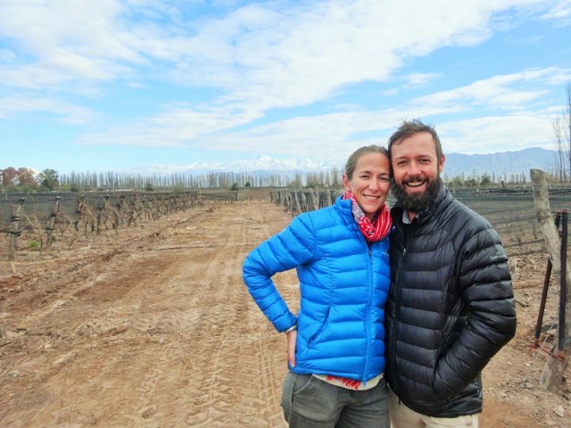 Enjoying our stroll amongst the vines with a snowy mountain backdrop