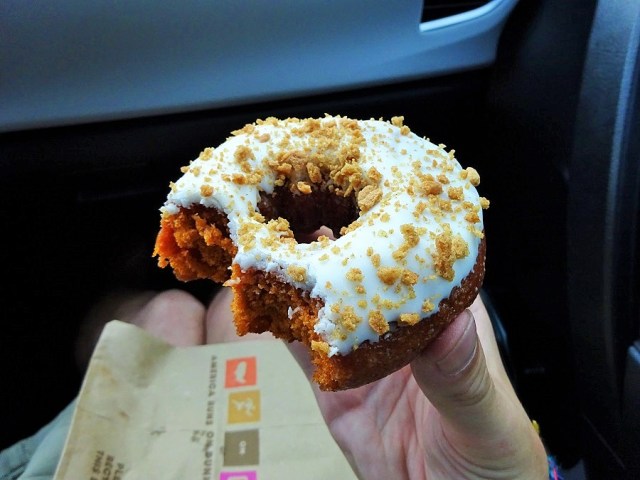 Breakfasting on a seasonal Pumpkin donut