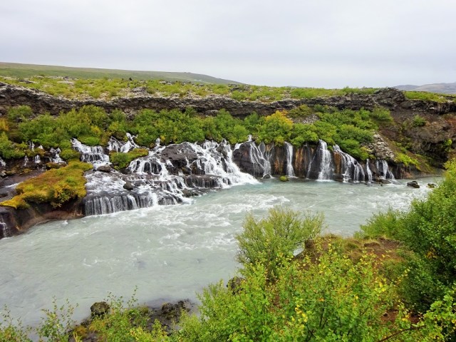 Water gushes from the porous rock that is Hraunfossar